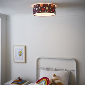 Blue flush ceiling light featuring a round fabric shade with colorful space-themed patterns, providing a warm glow, ideal for children's rooms.