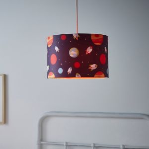 A 30cm drum-shaped lampshade featuring a dark space-themed design with colorful planets, rockets, and stars, made from fabric with an easy-fit attachment.