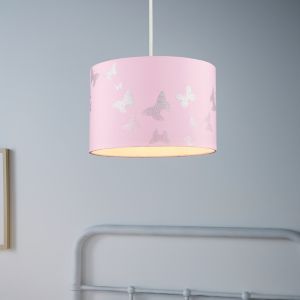 Pink cylindrical light shade featuring silver butterfly designs, made from fabric, suspended from a white cord, ideal for children's rooms.