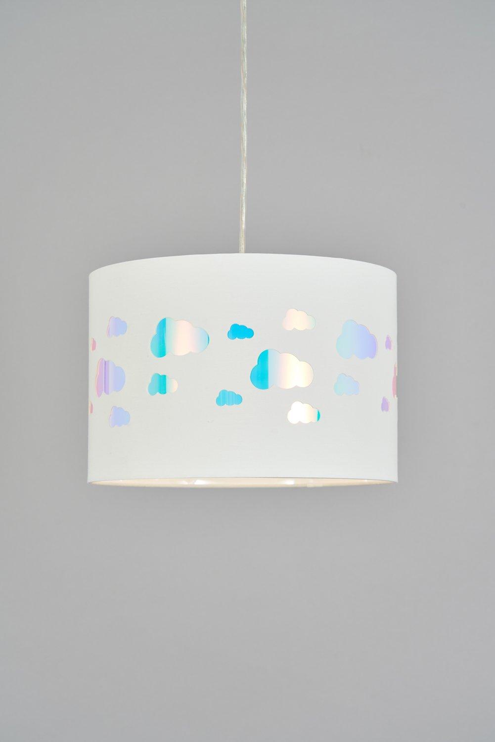 White cylindrical lampshade featuring iridescent cloud cutouts, creating a soft, colorful glow when illuminated, suspended by a simple cord against a gray background.
