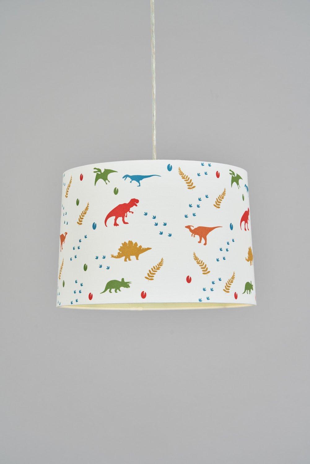 White lampshade featuring colorful dinosaur and fern patterns in red, green, blue, and yellow, designed to glow in the dark and easy to fit.