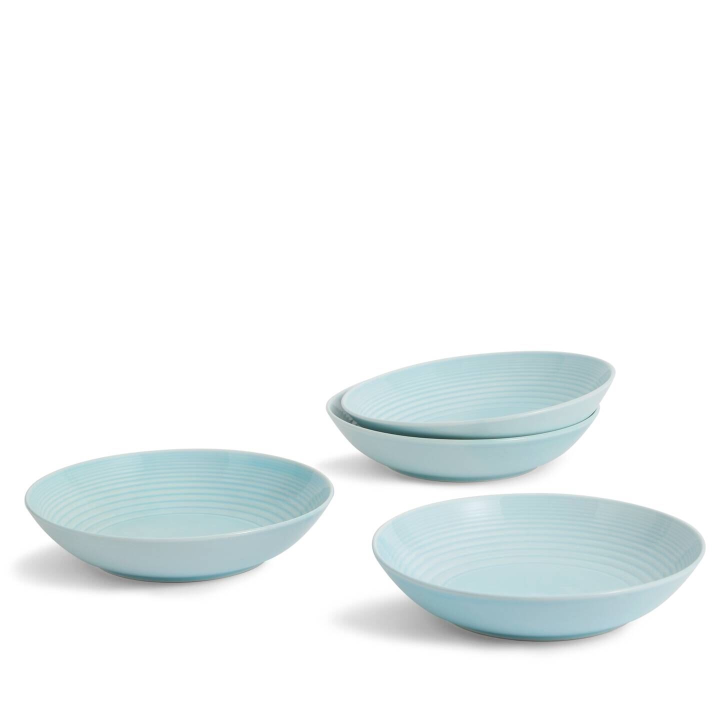 Set of four Gordon Ramsay Maze blue pasta bowls by Royal Doulton, featuring a smooth, glossy finish and subtle ribbed detailing, ideal for serving pasta and salads.