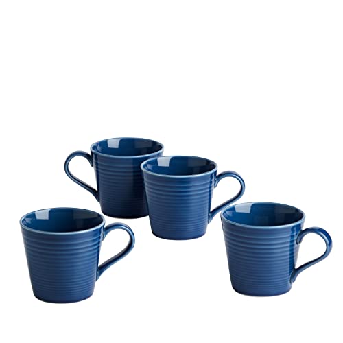 Set of four deep blue ceramic mugs featuring a ribbed design and comfortable handles, perfect for enjoying hot beverages.