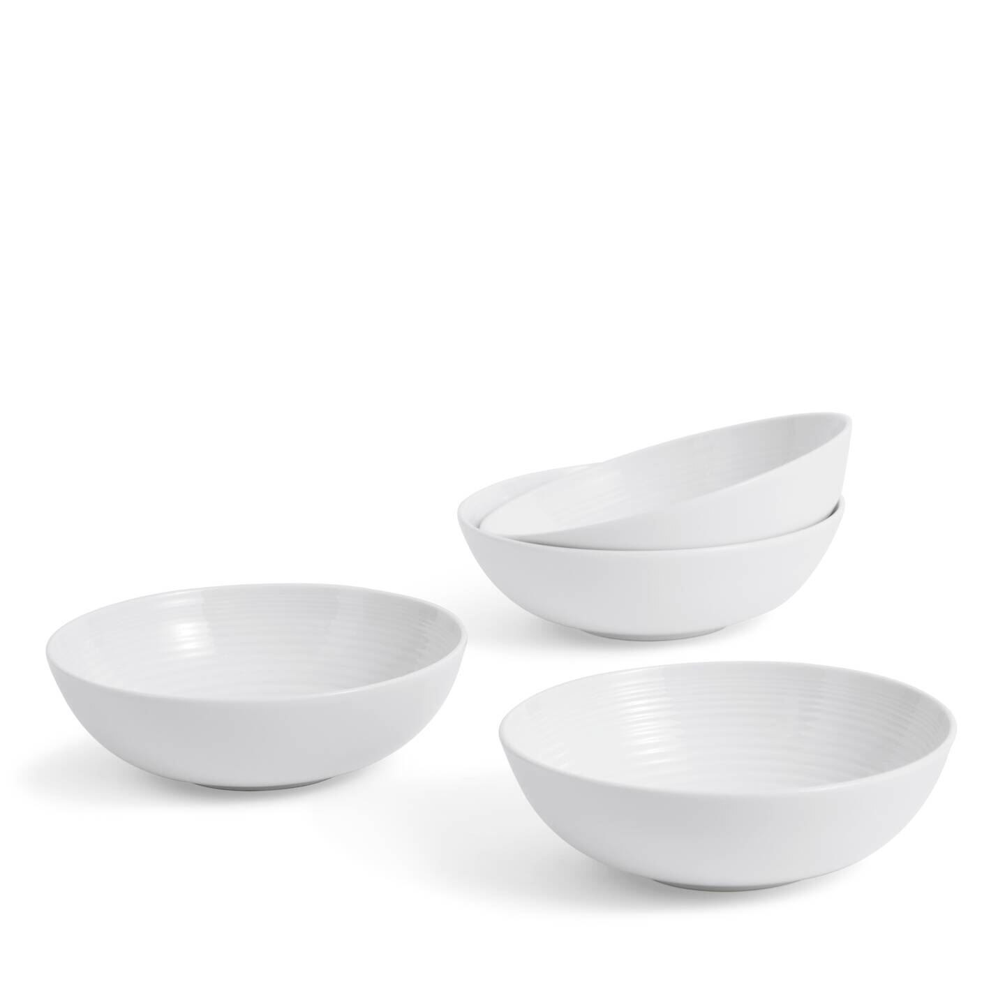 Set of four white ceramic cereal bowls with a subtle ribbed design, ideal for serving breakfast or snacks, designed by Royal Doulton for Gordon Ramsay's Maze collection.
