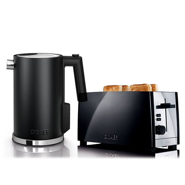 Sleek black electric kettle and matching four-slice toaster with chrome accents, featuring a modern design and simple control panel.
