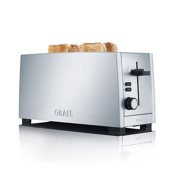 Stainless steel 4-slice toaster with a sleek design, featuring a black control knob, a lever, and four slices of toasted bread on top.