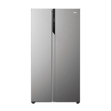 Stainless steel Haier Series 3 side-by-side fridge freezer with a sleek design, featuring a black control panel and spacious 528-litre capacity.