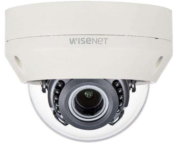 White dome-shaped security camera with a clear lens, featuring a black inner casing and the "Wisenet" logo, designed for outdoor surveillance.