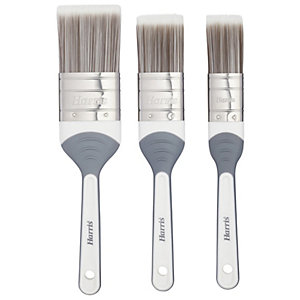 Three grey-handled paint brushes in a pack, featuring silver ferrules and soft bristles, designed for painting walls and ceilings by Harris.