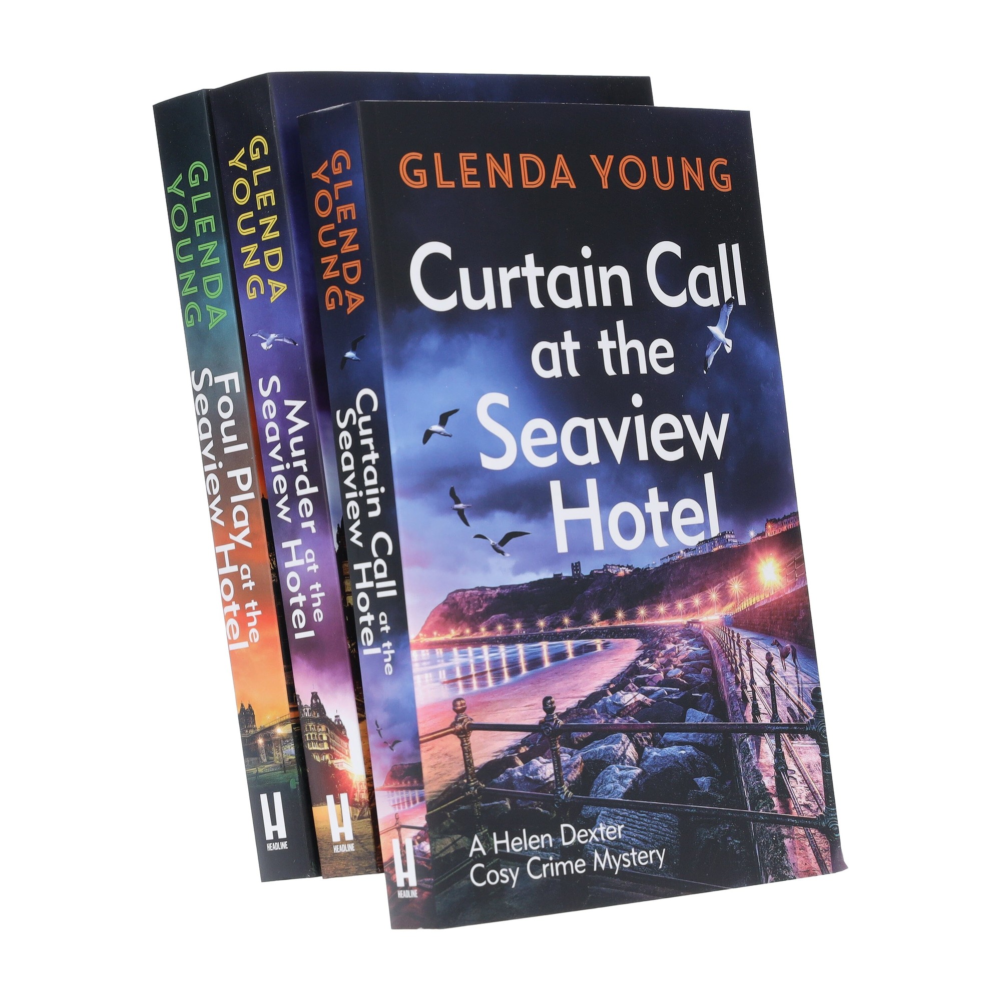 Three paperback books from the "Helen Dexter Cosy Crime Mysteries" collection by Glenda Young, featuring colorful covers with scenic images and titles prominently displayed.