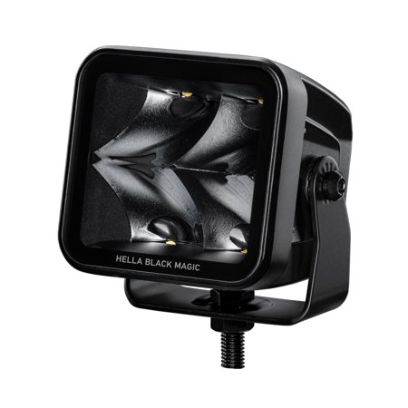 Black rectangular auxiliary light with a sturdy metal housing, featuring two powerful light beams and a mounting bracket for easy installation.