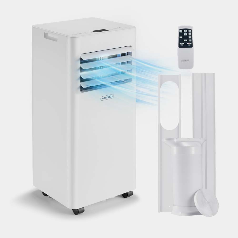 Compact white air conditioner with a sleek design, featuring adjustable front vents, a remote control, and a detachable water tank for dehumidifying, ideal for cooling spaces.
