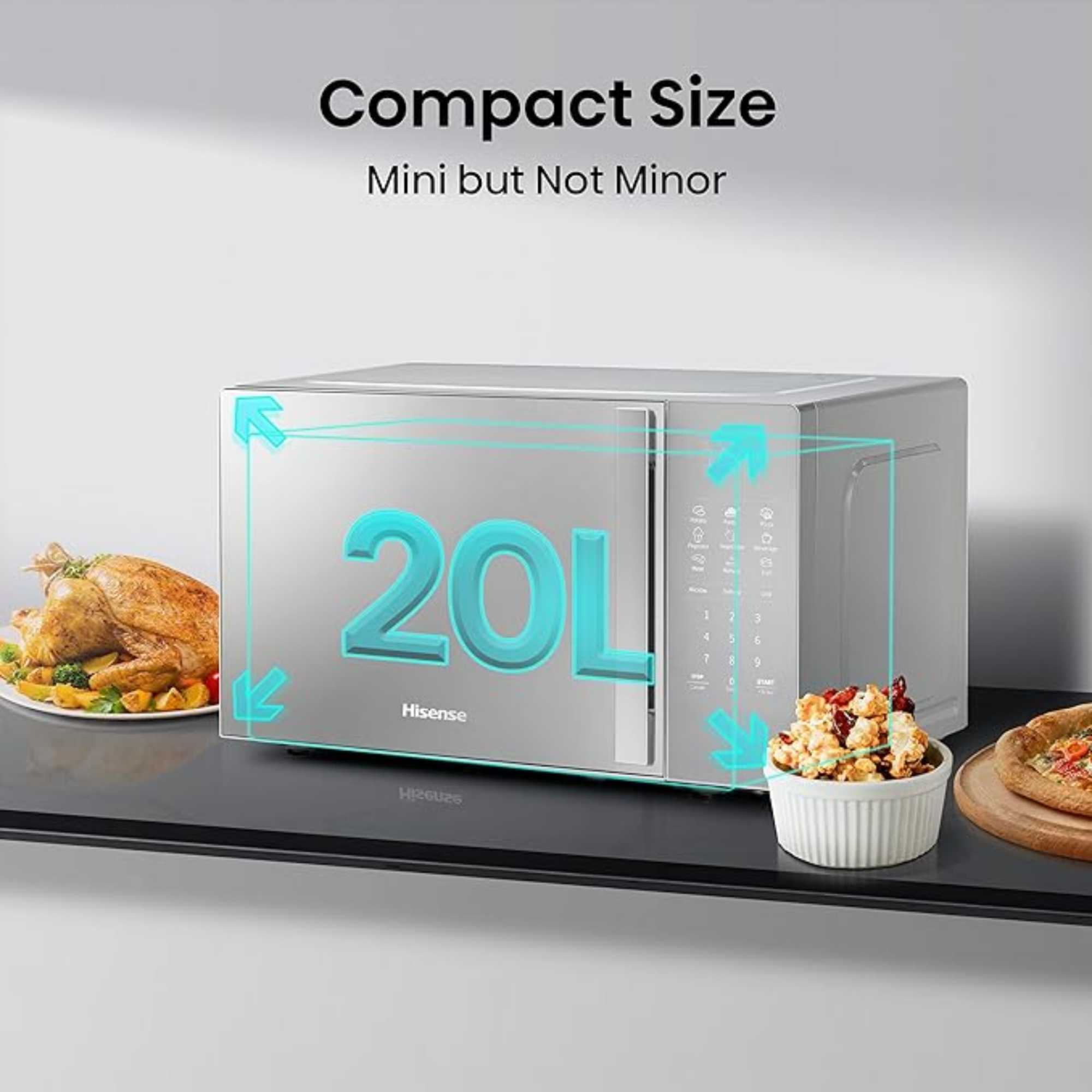 Silver Hisense microwave with a 20L capacity, featuring a sleek design, digital control panel, and compact size, placed on a countertop beside food items.