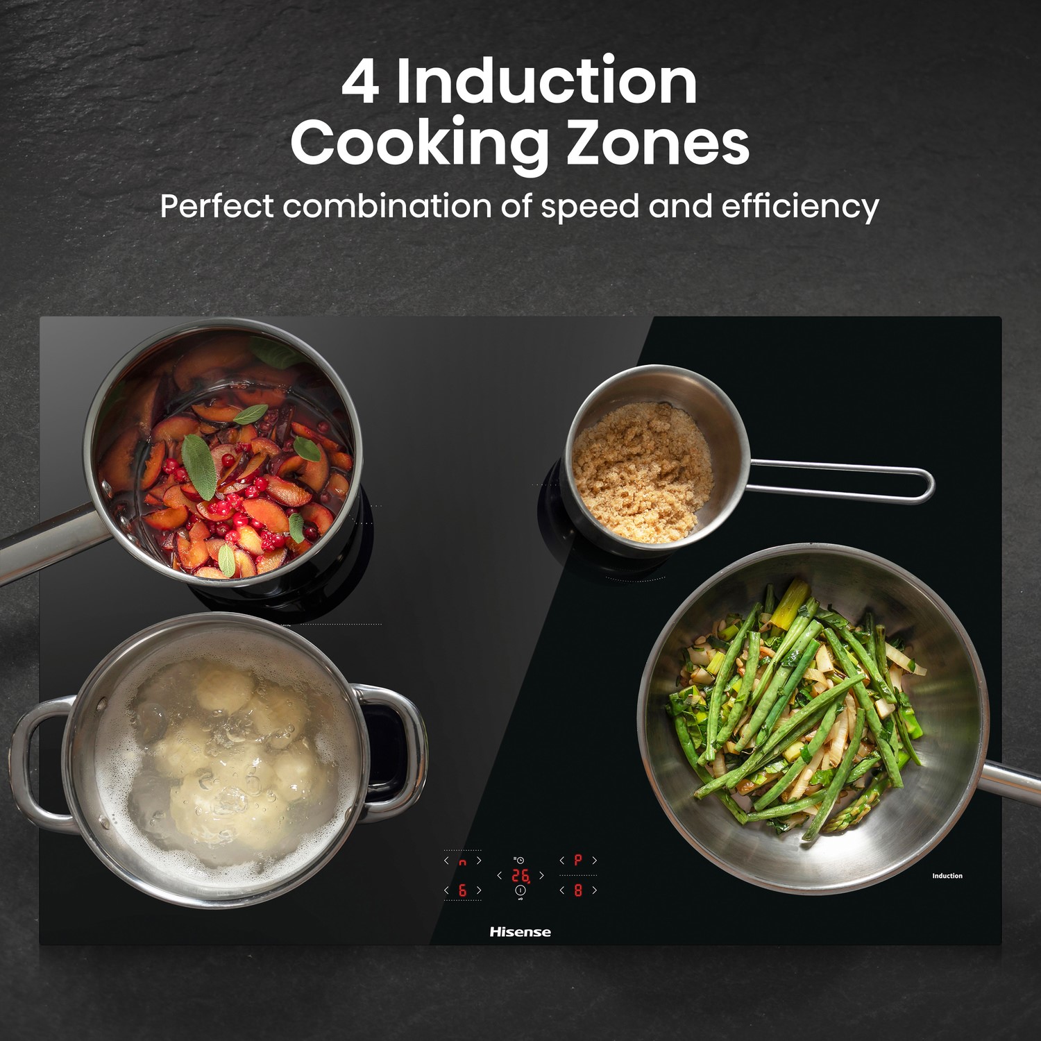 Black glass induction hob featuring four cooking zones, with pots of vegetables, grains, and herbs on the surface, showcasing a sleek and modern design.