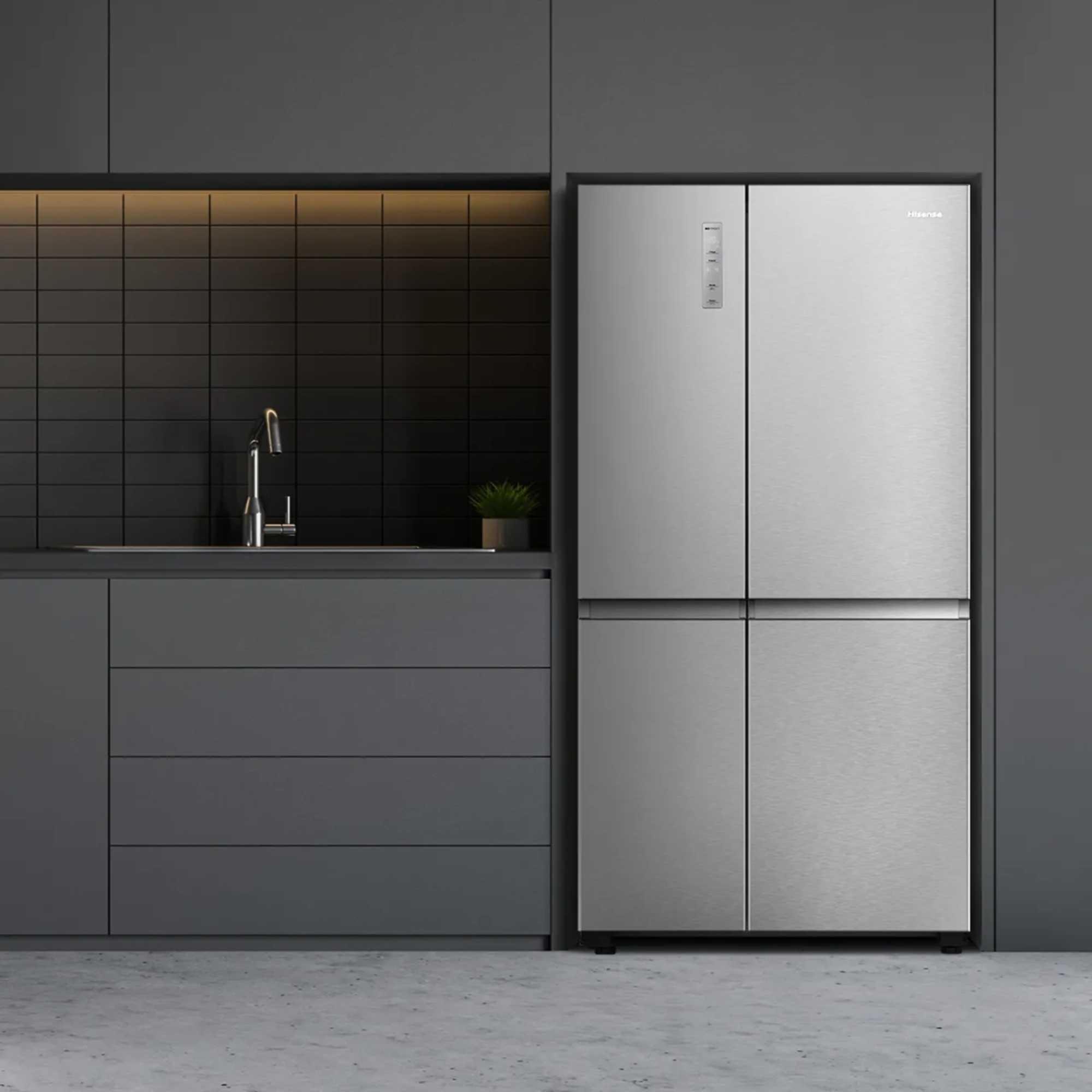 Stainless steel Hisense RS5P668SSCC refrigerator with a sleek design, featuring a digital display and four spacious compartments, set against a modern gray kitchen backdrop.
