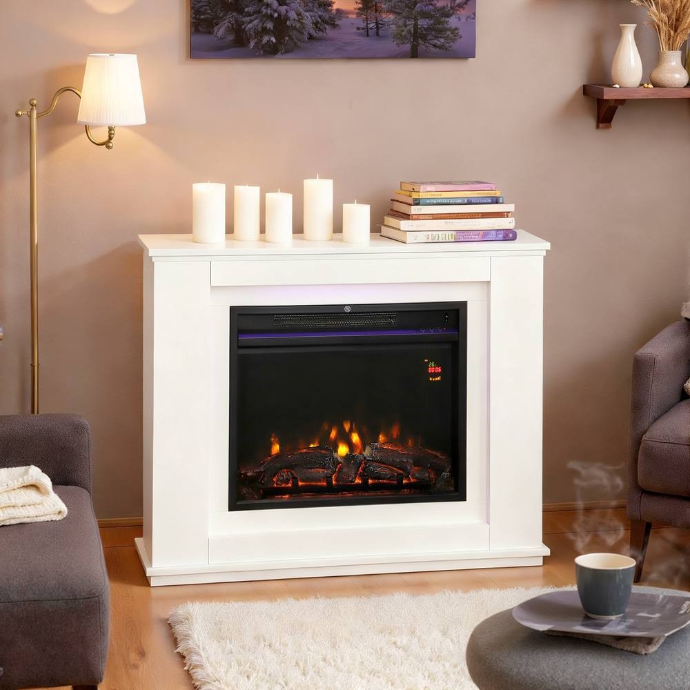 White electric fireplace with a sleek mantel, featuring a realistic flame effect, surrounded by candles and books, set in a cozy living room with a gray sofa and a coffee table.