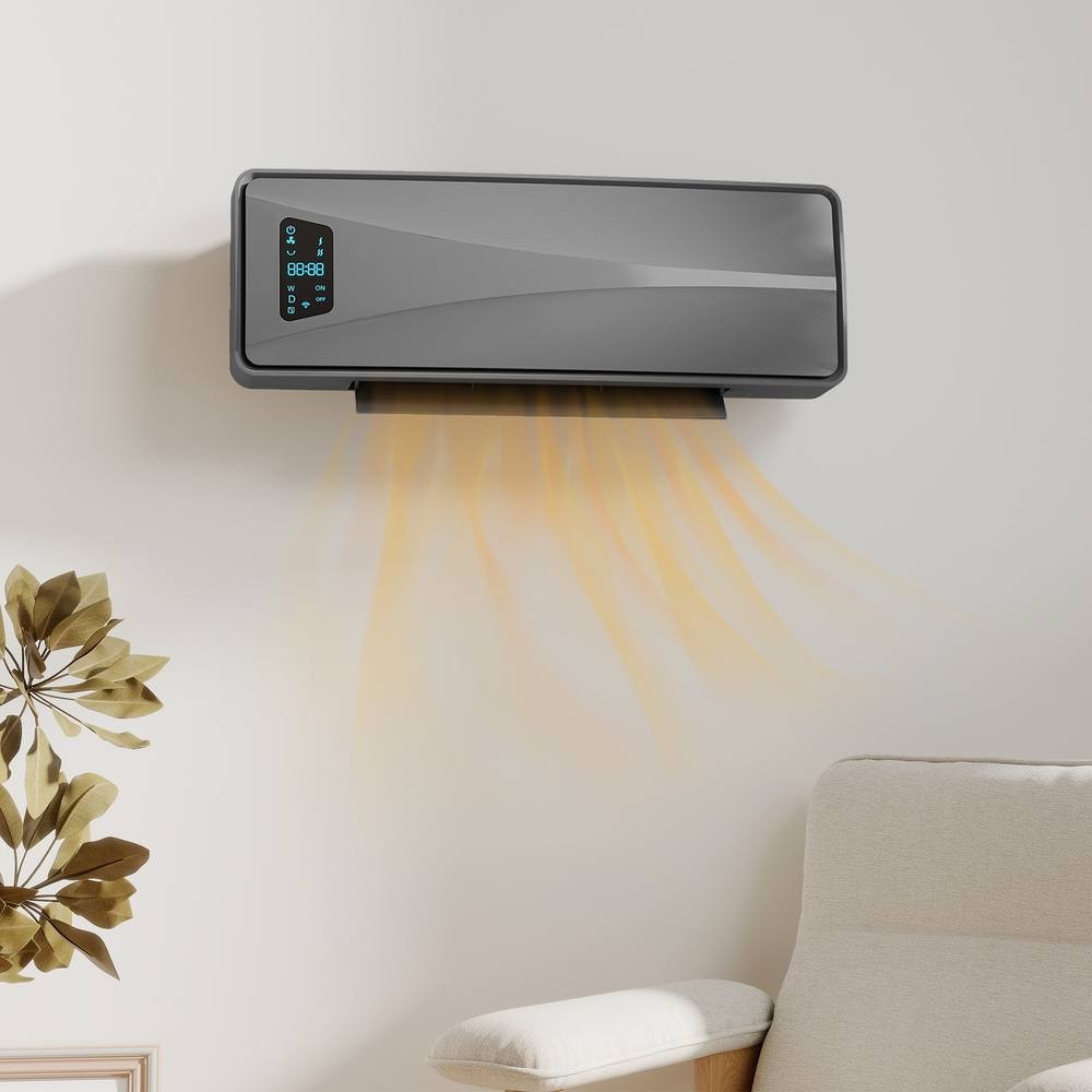 Grey wall-mounted ceramic electric heater with a sleek design, digital display, and fan feature, emitting warm air, positioned above a light-colored chair.