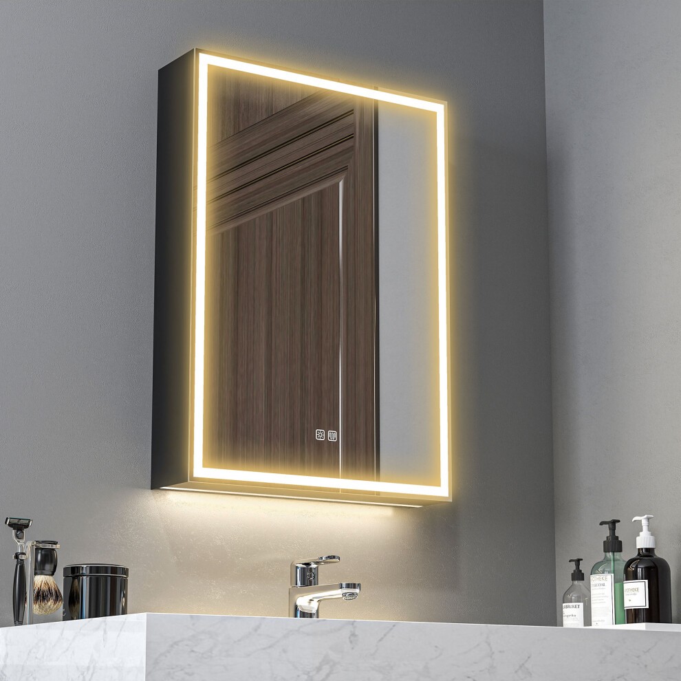 Black HOMCOM bathroom cabinet with a mirrored front, LED lights around the edges, and a demister pad, mounted above a marble countertop with toiletries and a faucet.