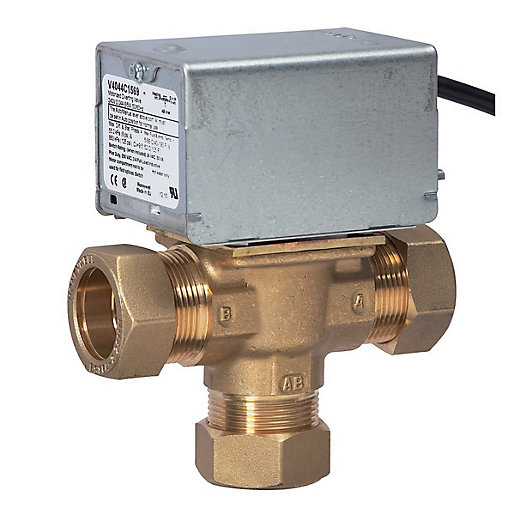 Honeywell V4044C1569 diverter valve with a brass body, featuring three connection points and a silver actuator on top, designed for efficient fluid control in heating systems.