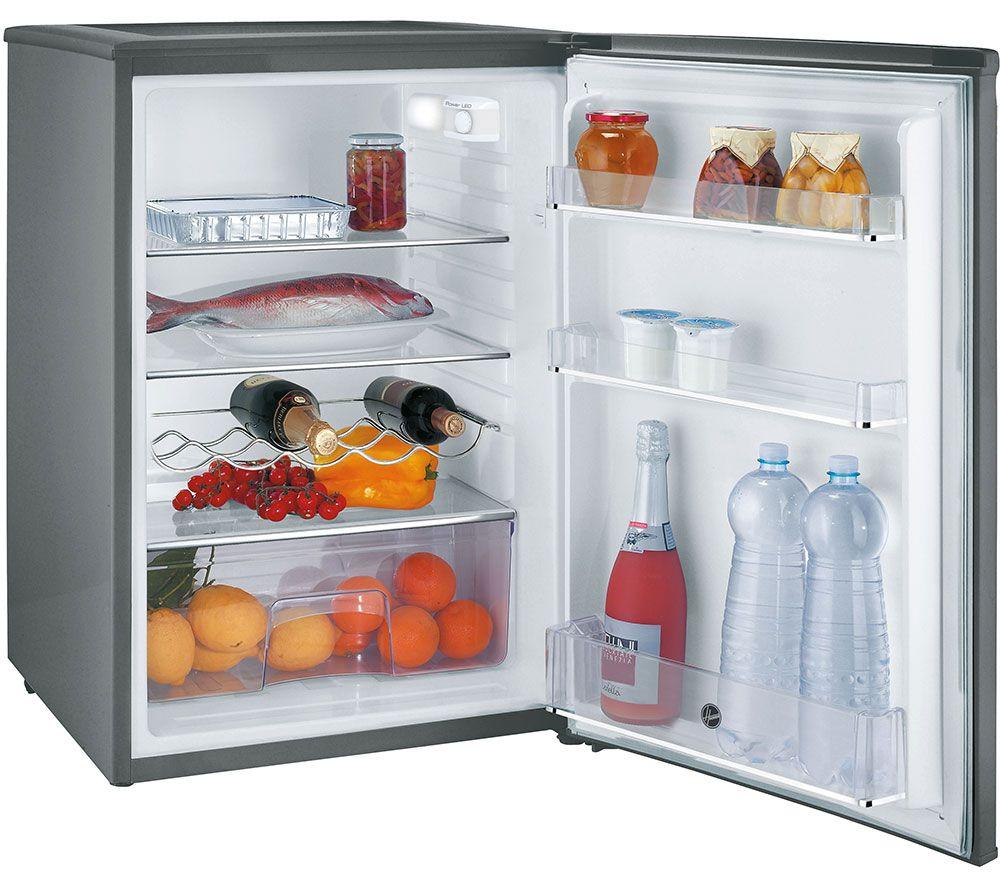 Stainless steel larder fridge with a sleek inox finish, featuring adjustable shelves, transparent storage drawers, and a variety of food items including fish, fruits, and beverages.