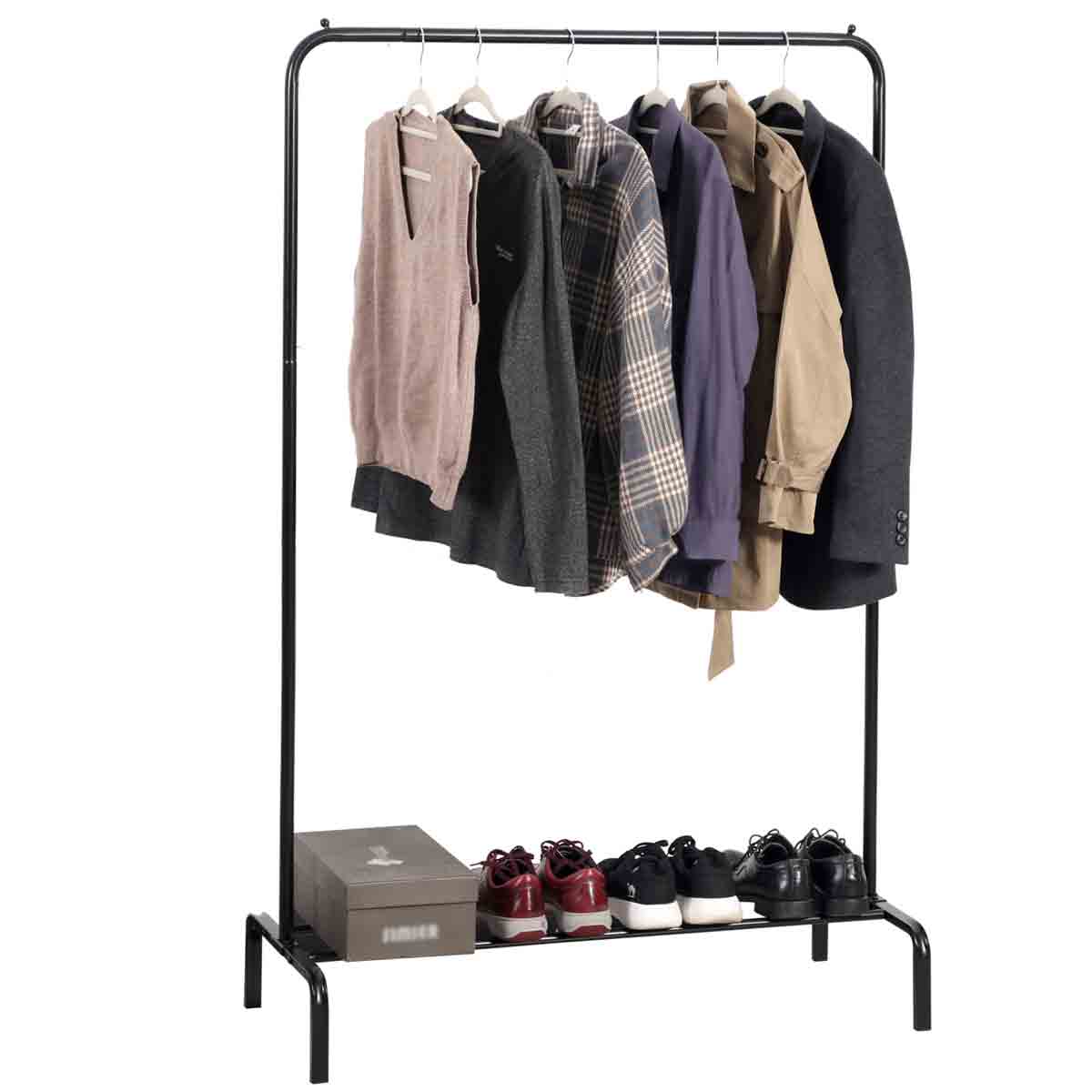 Freestanding black clothes rail made of metal, featuring a minimalist design with hanging garments and a lower shelf holding shoes and a box.