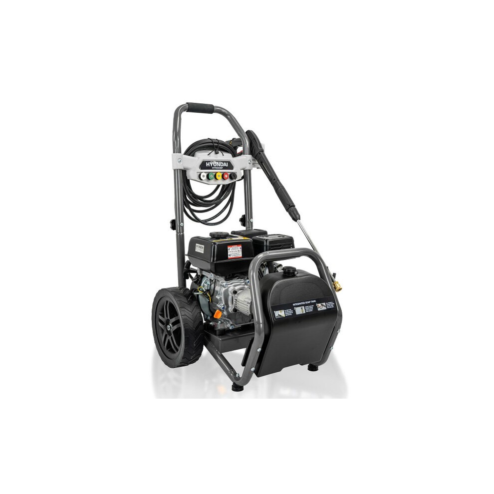 Hyundai HYW3400P petrol pressure washer in black and silver, featuring a sturdy frame, 10m hose, detergent tank, and large wheels for mobility.