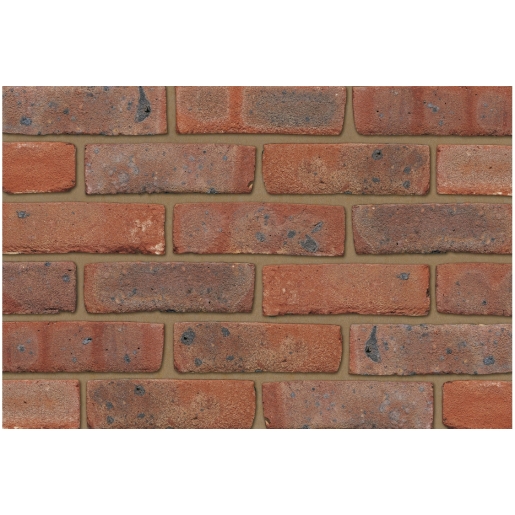 Mixed stock bricks in various shades of red and brown, featuring a textured surface with subtle variations and speckles, suitable for construction projects.