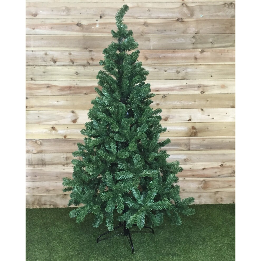 5ft green Imperial Pine Christmas tree with 340 tips and a 95cm diameter, featuring a lush, full design and a sturdy black metal stand, set against a wooden backdrop.