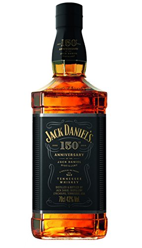 Jack Daniel's 150th Anniversary Tennessee Whiskey bottle, 70 Cl, features a black label with gold accents and a cork top, alongside two elegant rock glasses.