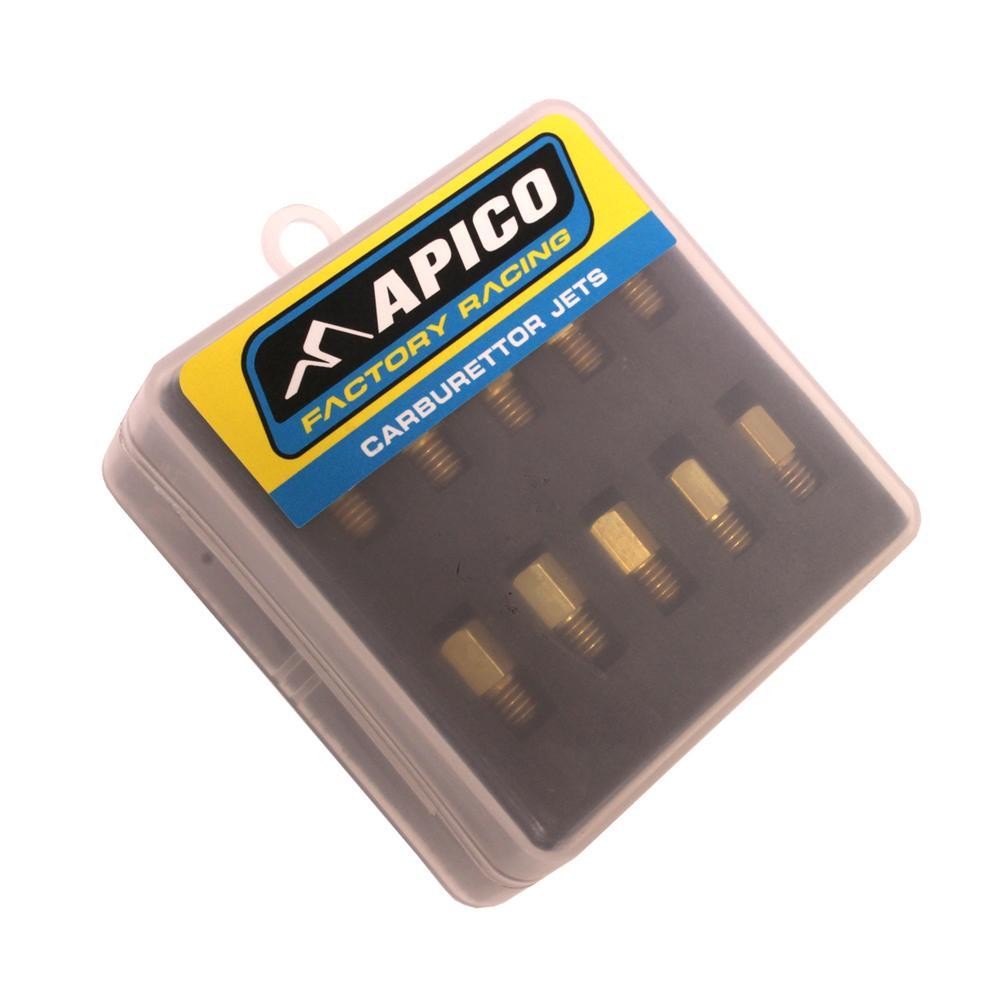 Clear plastic packaging containing ten brass carburetor jets labeled "APICO FACTORY RACING," with the jets arranged neatly inside and visible through the case.