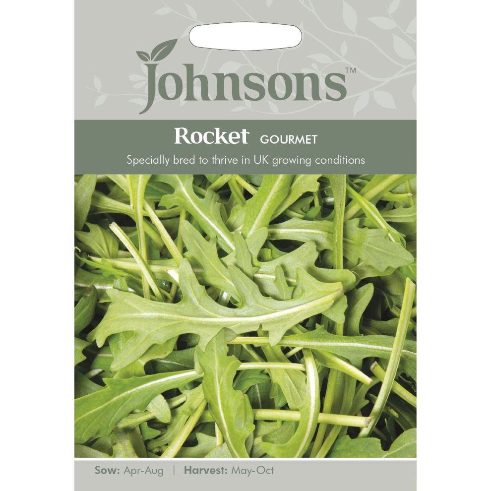 Green and white seed packet featuring "Johnsons" logo, labeled "Rocket Gourmet," with a close-up of fresh rocket leaves, and details on sowing and harvesting times.