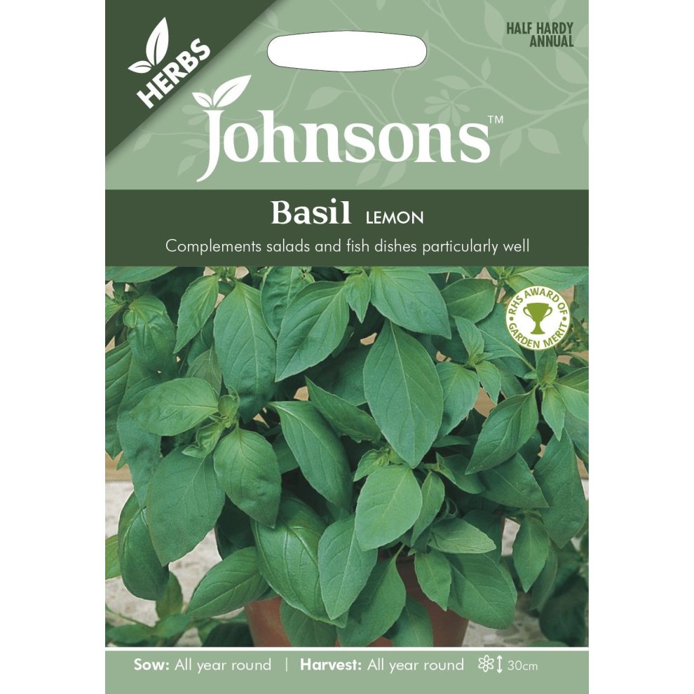Green packaging featuring the Johnsons Seeds logo, with a clear image of lush basil leaves, labeled "Basil Lemon," highlighting its use in salads and fish dishes.