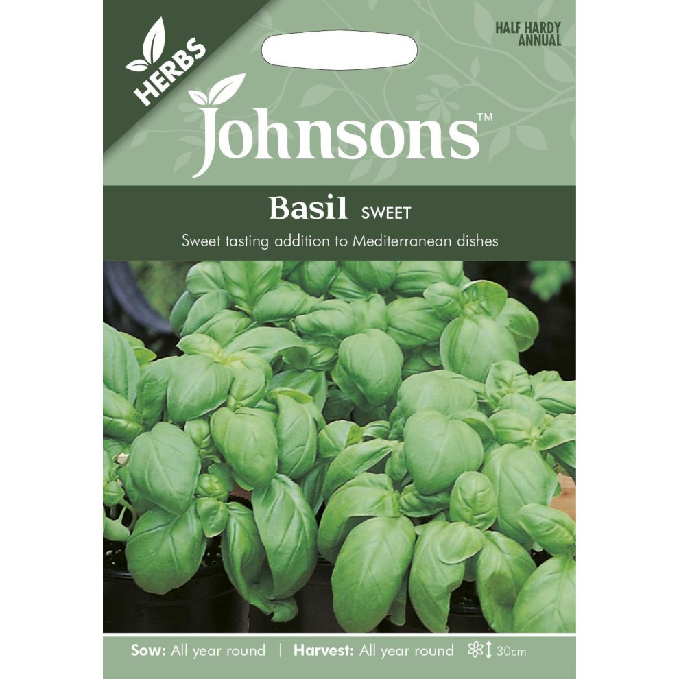 Green packet featuring "Johnsons" branding, labeled "Basil Sweet," with a vibrant image of fresh basil leaves, and details on sowing and harvesting.