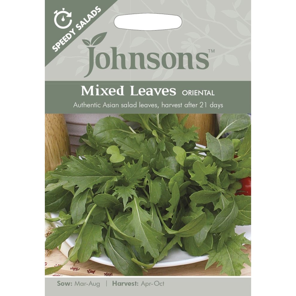 Pictorial seed pack featuring Johnsons Seeds logo, showcasing a variety of green leafy vegetables labeled "Mixed Leaves Oriental," with sowing and harvesting details.