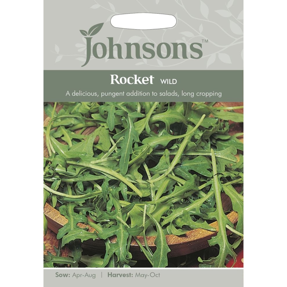 Packaged seeds for "Johnsons Rocket Seeds - Wild," featuring vibrant green arugula leaves on a wooden bowl background, with sowing and harvesting details on the label.