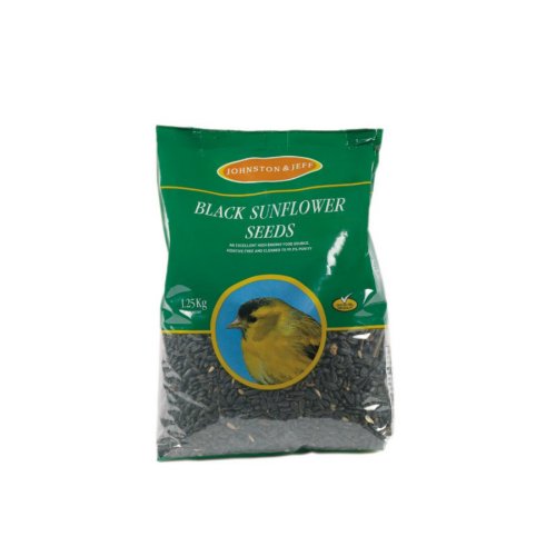 Green bag labeled "BLACK SUNFLOWER SEEDS" with a yellow bird graphic, containing black oil sunflower seeds, weighing 1.25kg, by Johnston & Jeff.