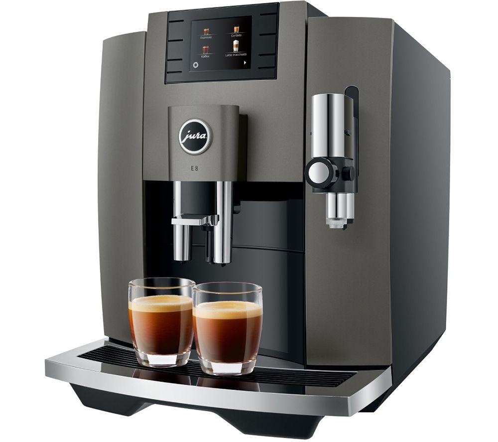 Sleek dark inox Jura E8 coffee machine with a digital display, dual coffee spouts, and two glasses of espresso, showcasing its modern design and functionality.