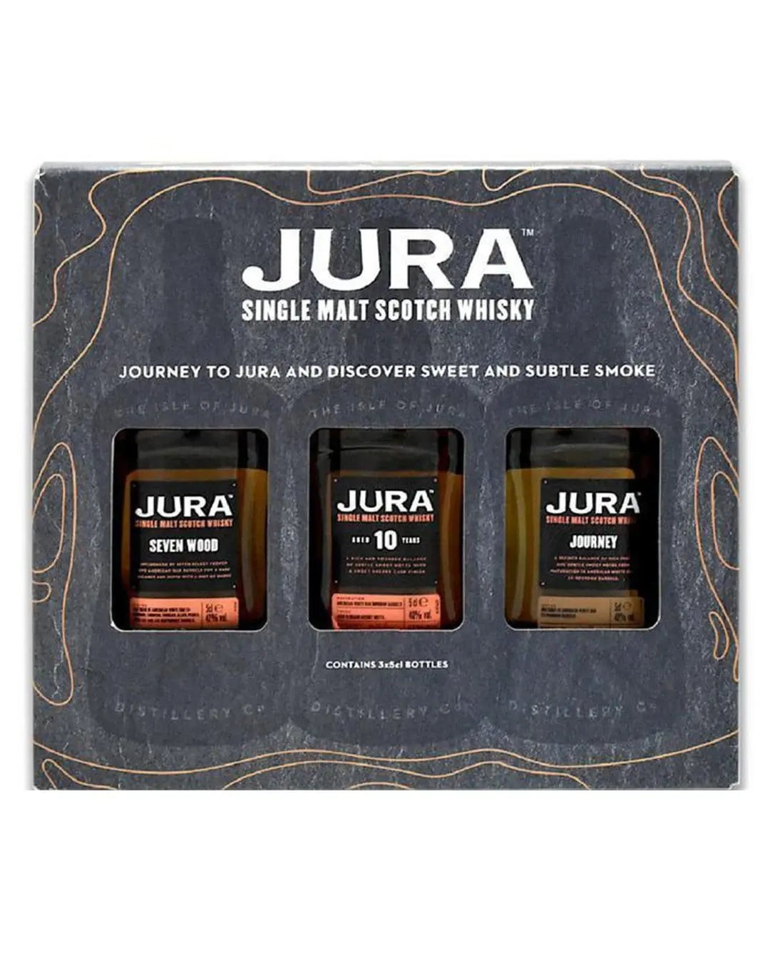 Three miniature bottles of Jura Single Malt Scotch Whisky, each 5 cl, featuring distinct labels: "Seven Wood," "10 Year," and "Journey," all presented in a stylish black gift box.