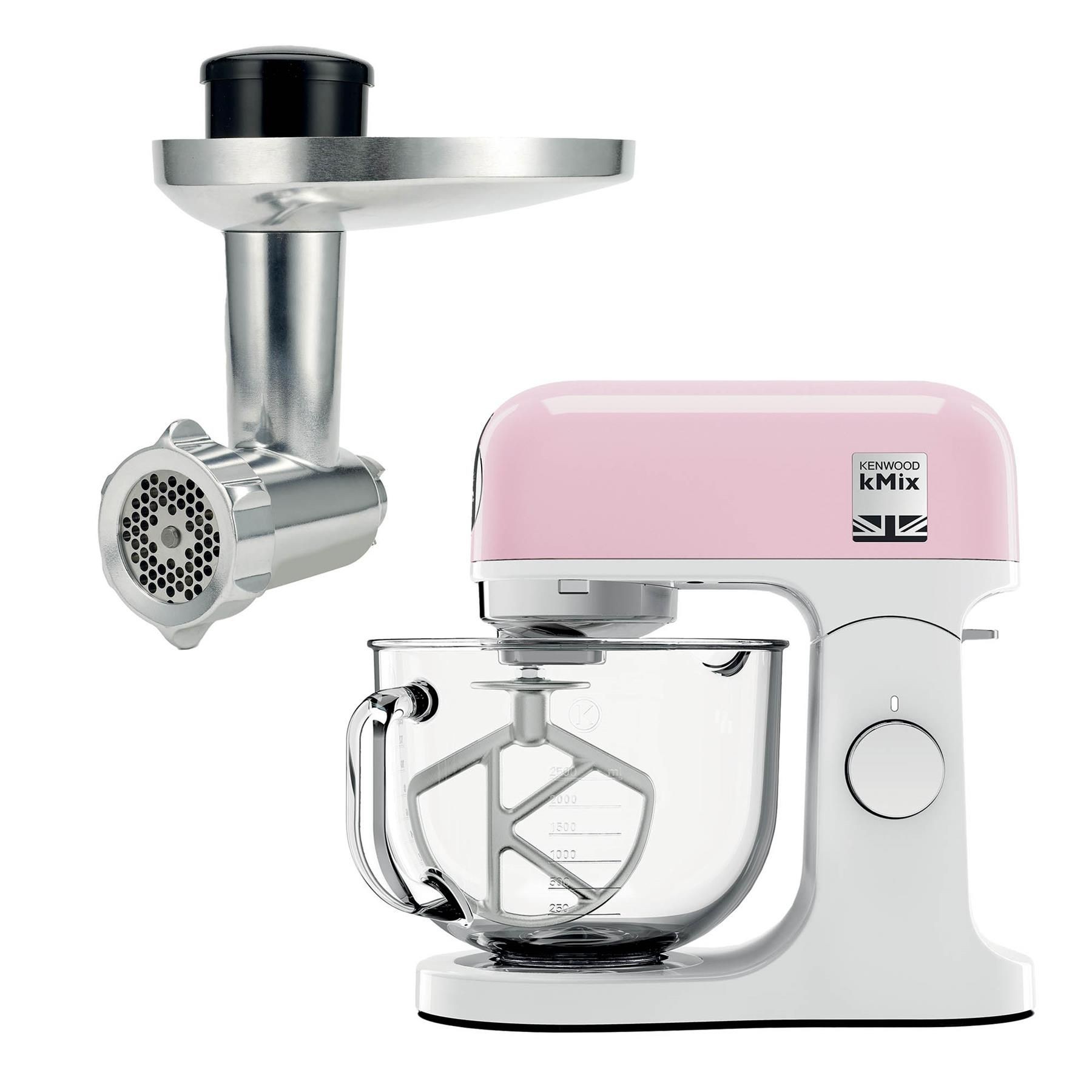 Kenwood 5L Kmix Stand Mixer in pink with a glass mixing bowl, white base, and a silver metal food mincer attachment.