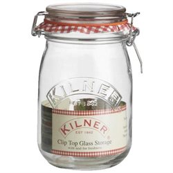Clear glass round jar with a clip top lid, featuring a red and white gingham pattern on the seal, labeled "Kilner Clip Top Glass Storage," sold in a pack of 12.