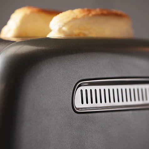 Black KitchenAid Artisan 2 Slice Toaster with a sleek metal finish, featuring a crumb tray and two slices of toasted bread peeking out from the top.