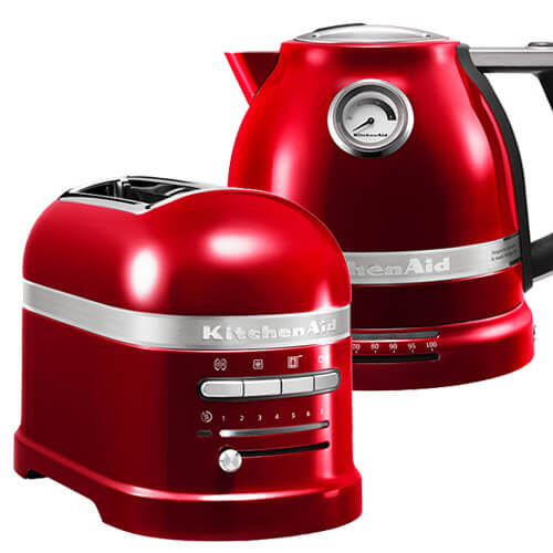 Bright red KitchenAid Artisan toaster and kettle set, featuring a sleek design with a stainless steel band, multiple settings on the toaster, and a gauge on the kettle.