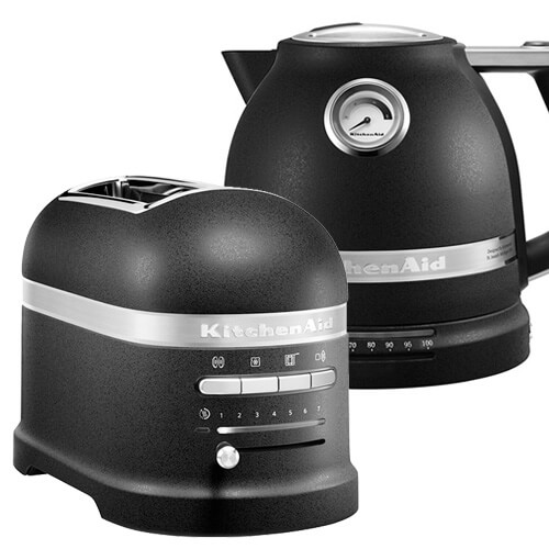 Black cast iron KitchenAid Artisan toaster with two slots and a kettle featuring a gauge, both with a sleek design and silver accents.