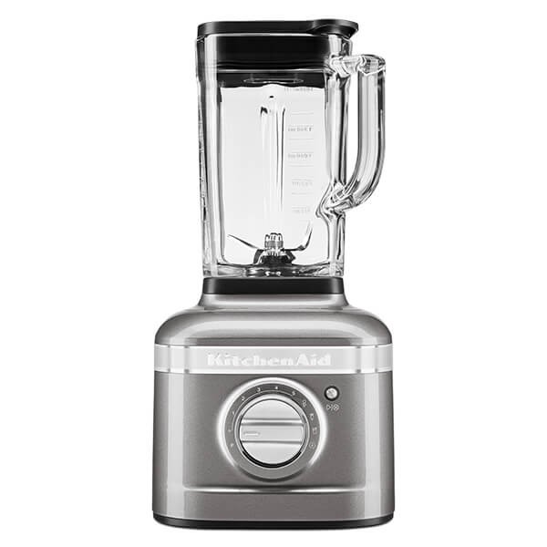 Medallion silver KitchenAid K400 Artisan blender with a glass pitcher, a black lid, and a control knob on the front for easy operation.