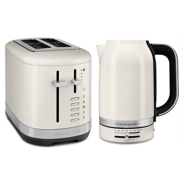 Cream-colored porcelain kettle and matching two-slice toaster set, featuring sleek black handles, chrome accents, and easy-to-read controls.