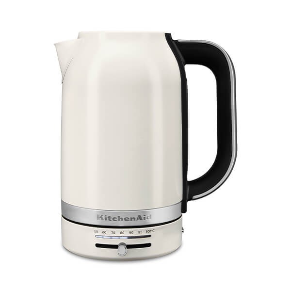 Cream-colored porcelain kettle with a sleek design, featuring a black handle, a silver band, and a temperature gauge on the front.