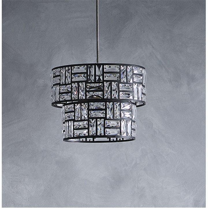 Black drum pendant light shade featuring a geometric design with acrylic glass accents, suspended from a silver cord against a textured gray background.