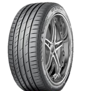 Kumho Ecsta PS71 tire featuring a sleek black rubber design with deep tread grooves and a sporty sidewall, mounted on a silver multi-spoke alloy wheel.
