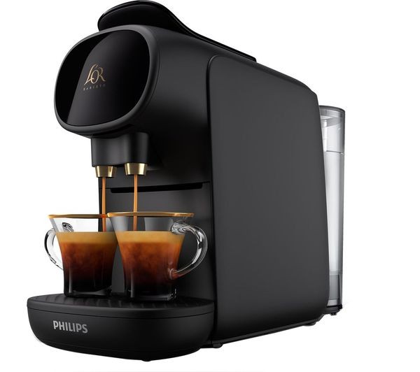 Black L'or by Philips Barista Sublime coffee machine with two espresso cups, sleek design, and water reservoir, accompanied by 50 coffee capsules.
