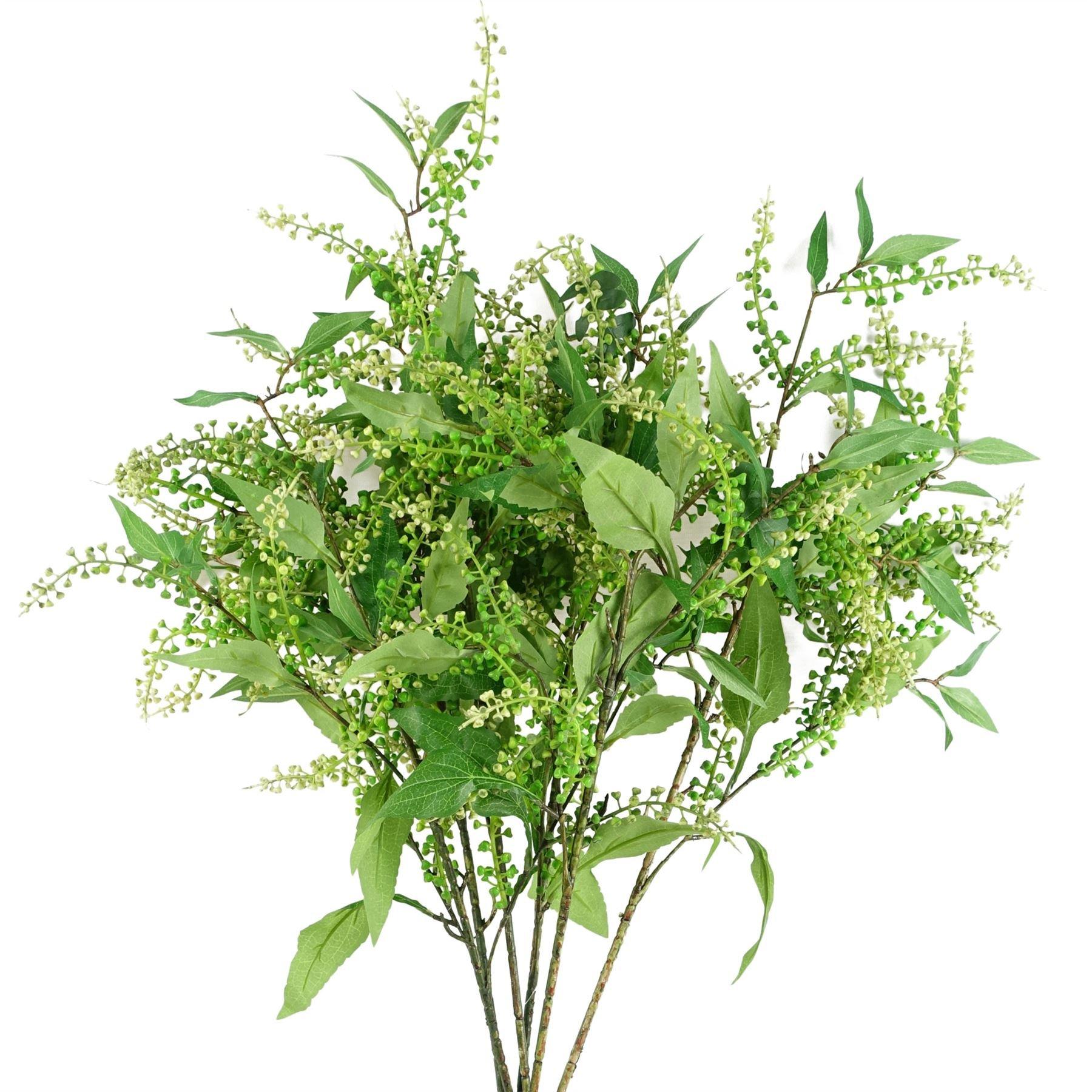 Pack of 6 artificial green foliage sprays, each 85cm tall, featuring a mix of vibrant green leaves and small, delicate white flowers on flexible stems.
